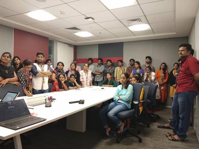 Google Ads team gathered in a meeting room